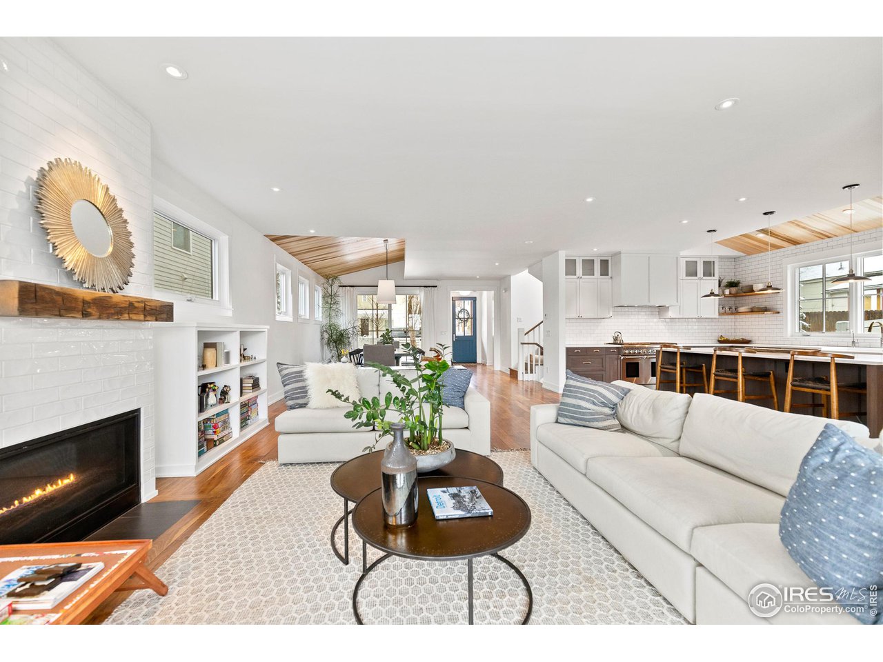 3184 9th Street Boulder, CO 80304 - Photo 3 of 39 a living room with furniture and a fireplace