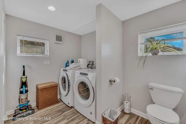 a bathroom with a toilet and a sink
