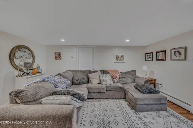 a living room with furniture and a couch