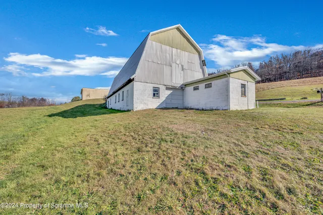 a view of a street with an ocean view