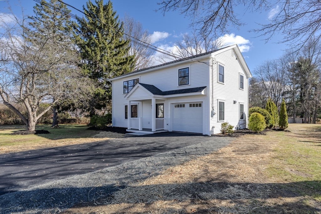 265 Stanley Street Amherst, MA 01002 - Photo 1 of 35 a view of a house with a yard