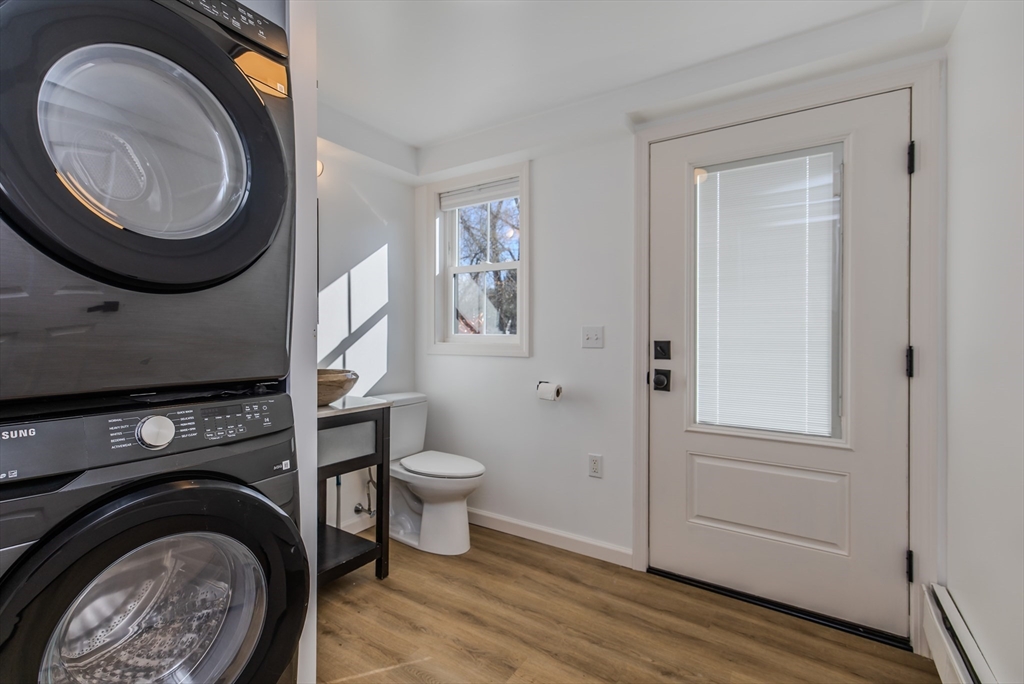 265 Stanley Street Amherst, MA 01002 - Photo 12 of 35 a bathroom with a toilet a sink and a mirror