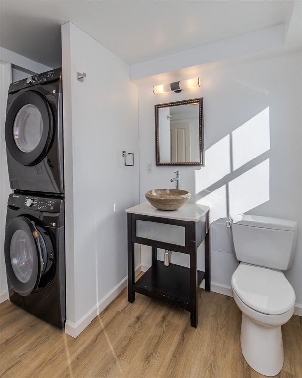 265 Stanley Street Amherst, MA 01002 - Photo 13 of 35 a bathroom with a toilet a sink and a mirror