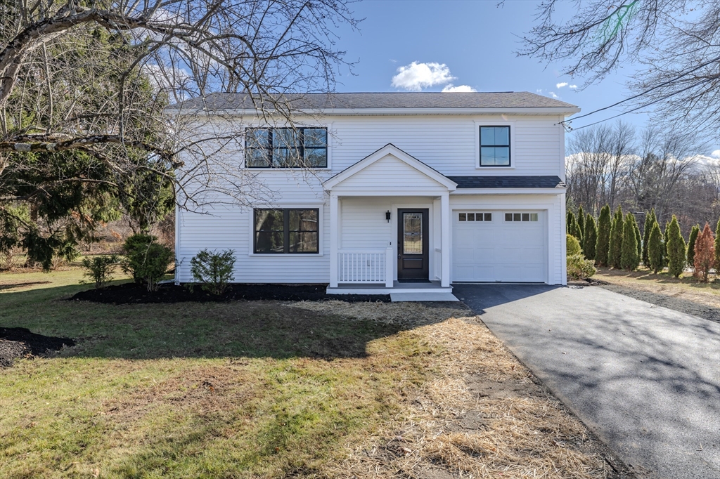 265 Stanley Street Amherst, MA 01002 - Photo 2 of 35 a front view of a house with a yard