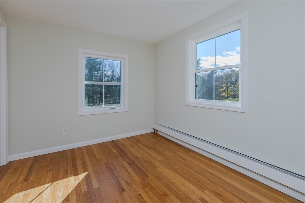 265 Stanley Street Amherst, MA 01002 - Photo 24 of 35 a view of room with window and hardwood floor