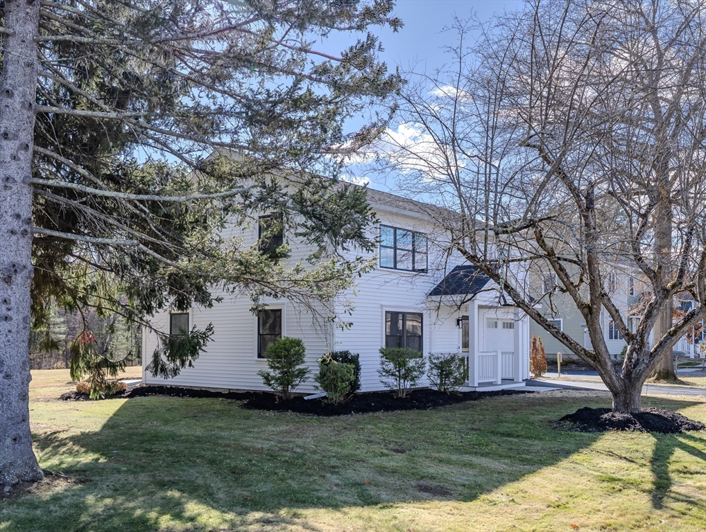 265 Stanley Street Amherst, MA 01002 - Photo 3 of 35 a front view of house with yard and green space