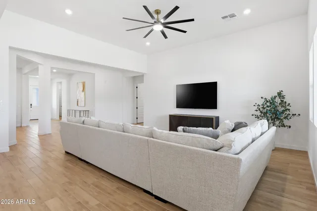 a kitchen with a refrigerator and a sink