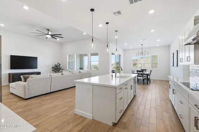 a bedroom with a bed and a cabinets