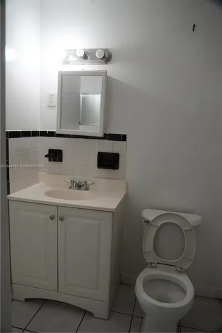 a room with table and mirror