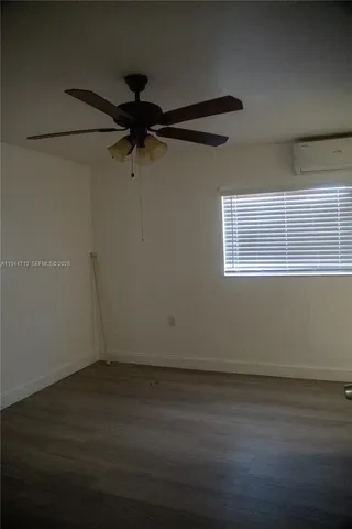 a bathroom view of a toilet and a sink