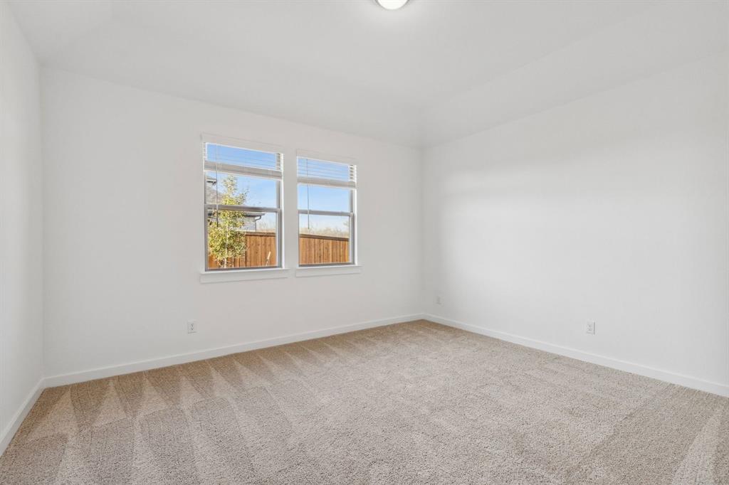 1871 Balfour Bend Forney, TX 75126 - Photo 14 of 30 an empty room with a window