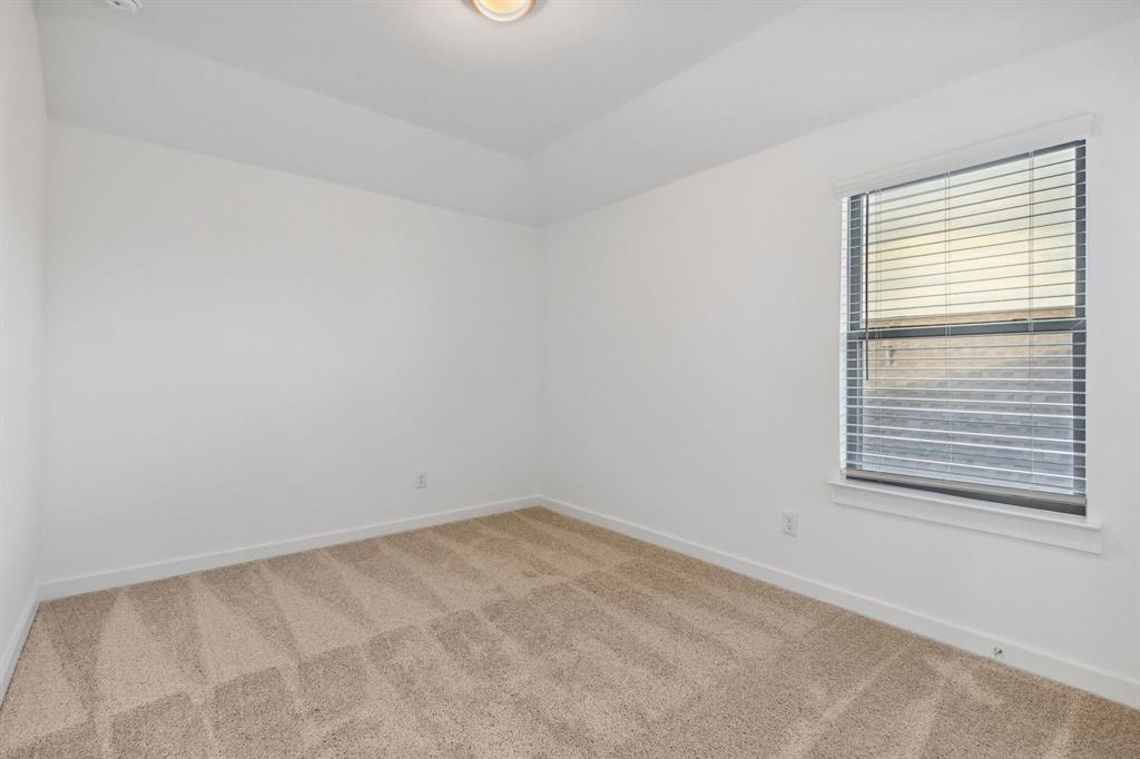 1871 Balfour Bend Forney, TX 75126 - Photo 25 of 30 an empty room with a window