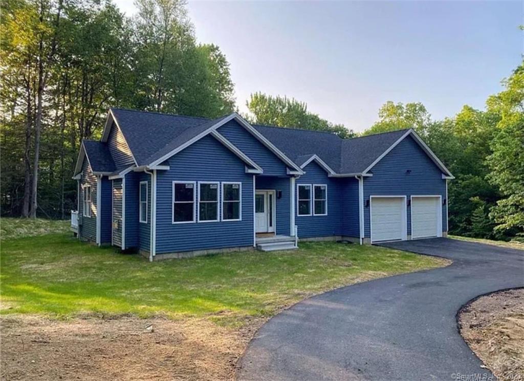 19 Ratlum Mountain Road Barkhamsted, CT 06063 - Photo 1 of 1 a front view of a house with a yard and garage