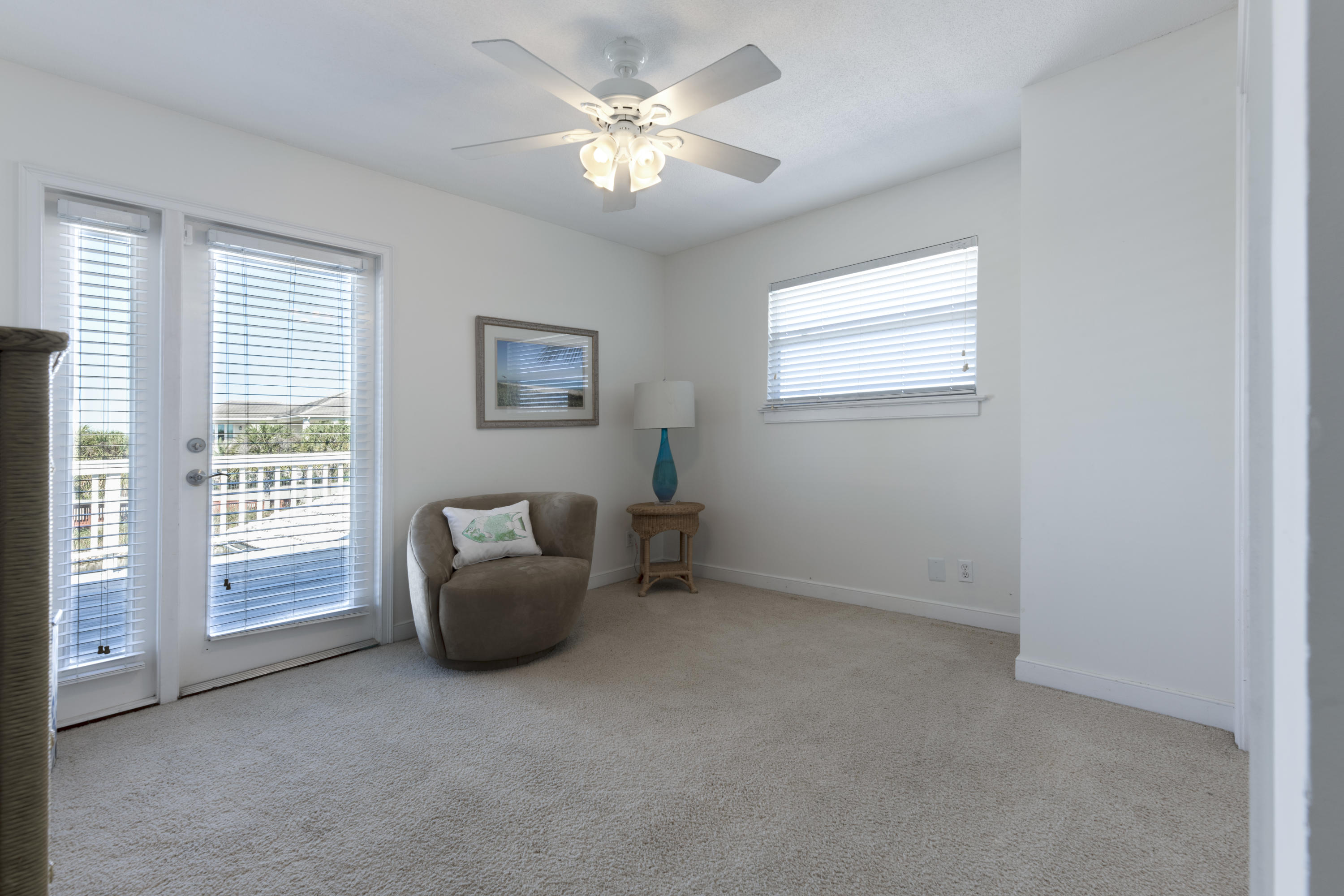 12920 Barrow Road North Palm Beach, FL 33408 - Photo 24 of 32 a living room with furniture and a window