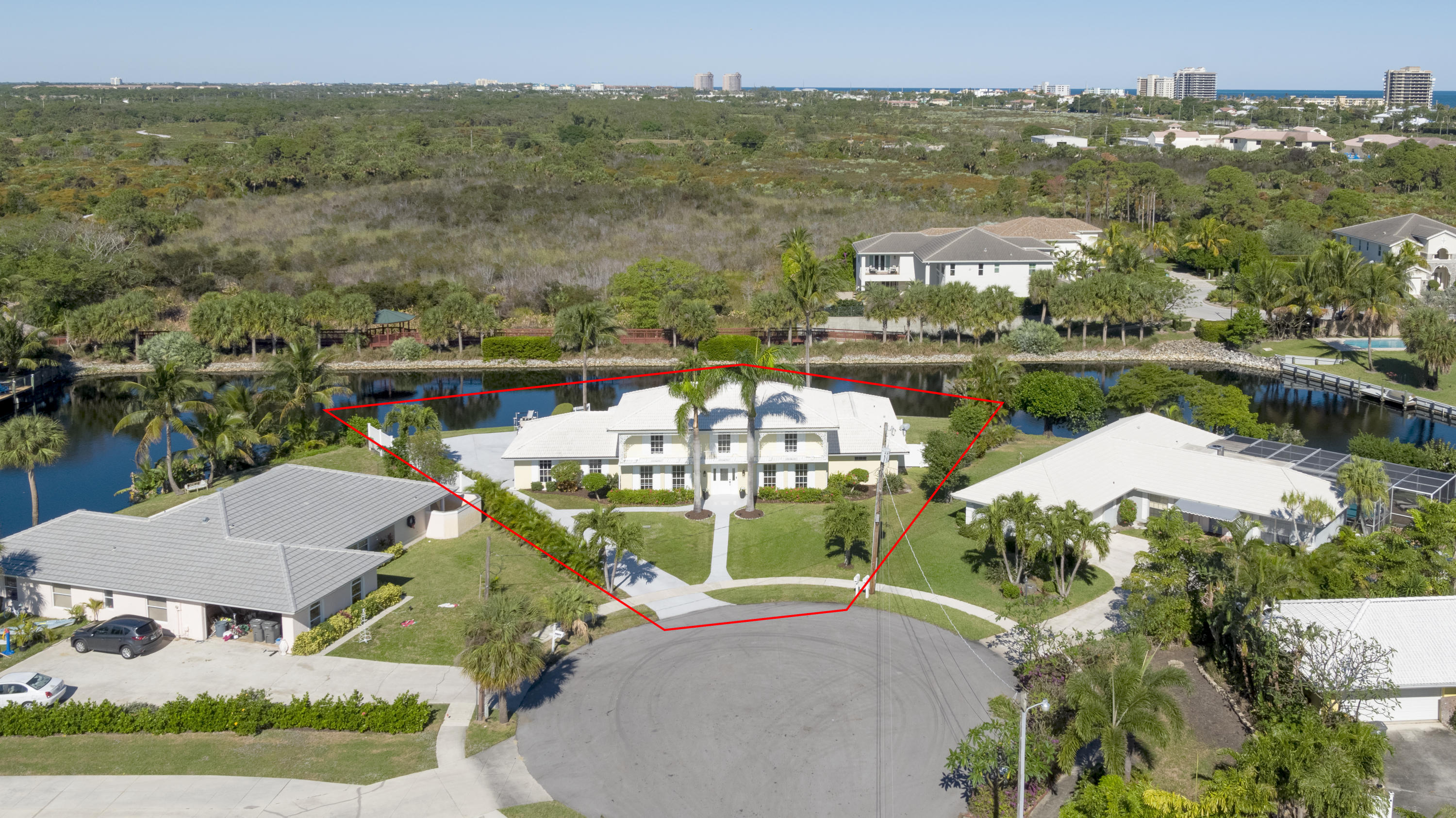 12920 Barrow Road North Palm Beach, FL 33408 - Photo 3 of 32 an aerial view of residential houses with outdoor space and lake view