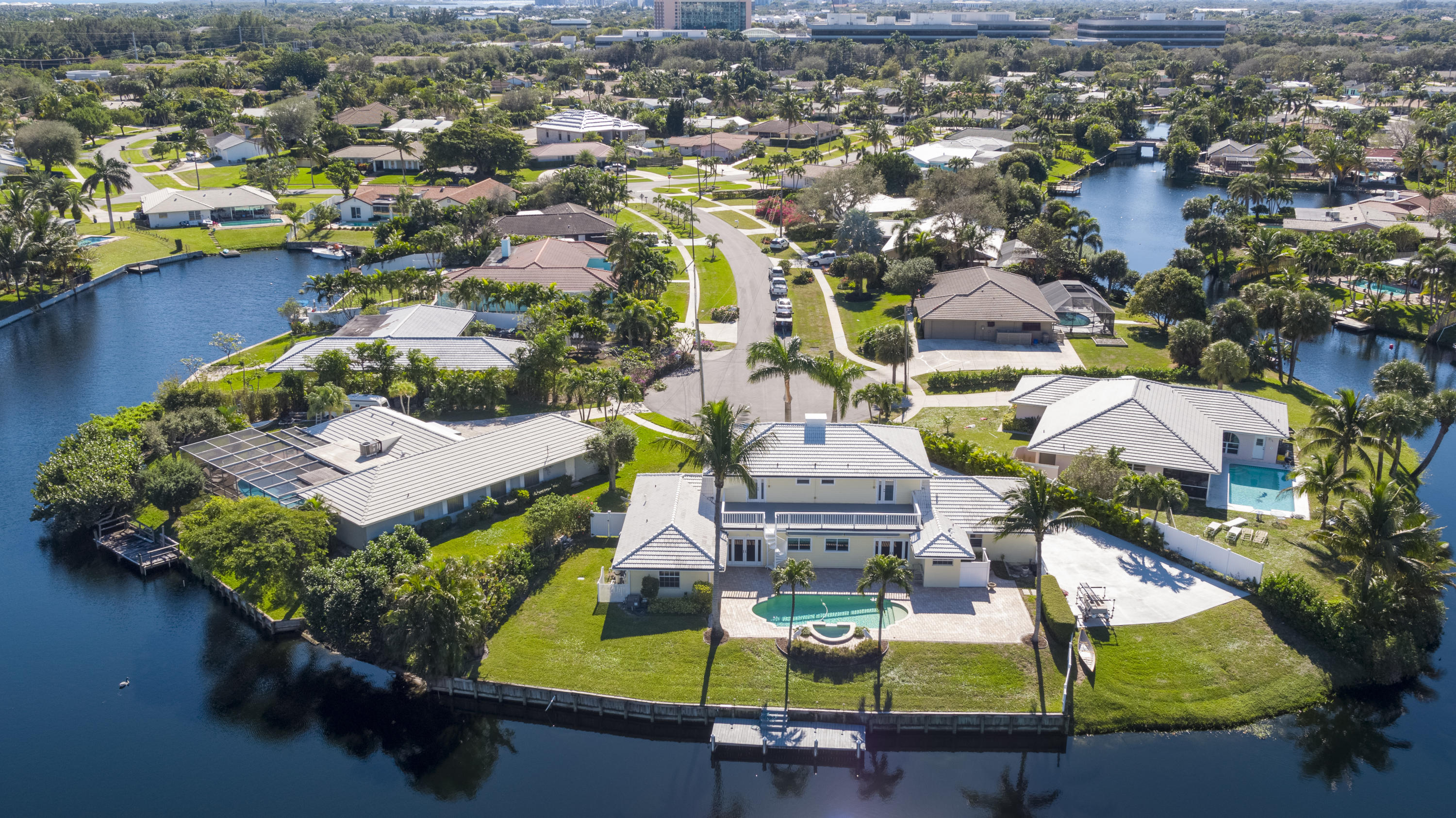 12920 Barrow Road North Palm Beach, FL 33408 - Photo 31 of 32 an aerial view of residential houses with outdoor space and swimming pool