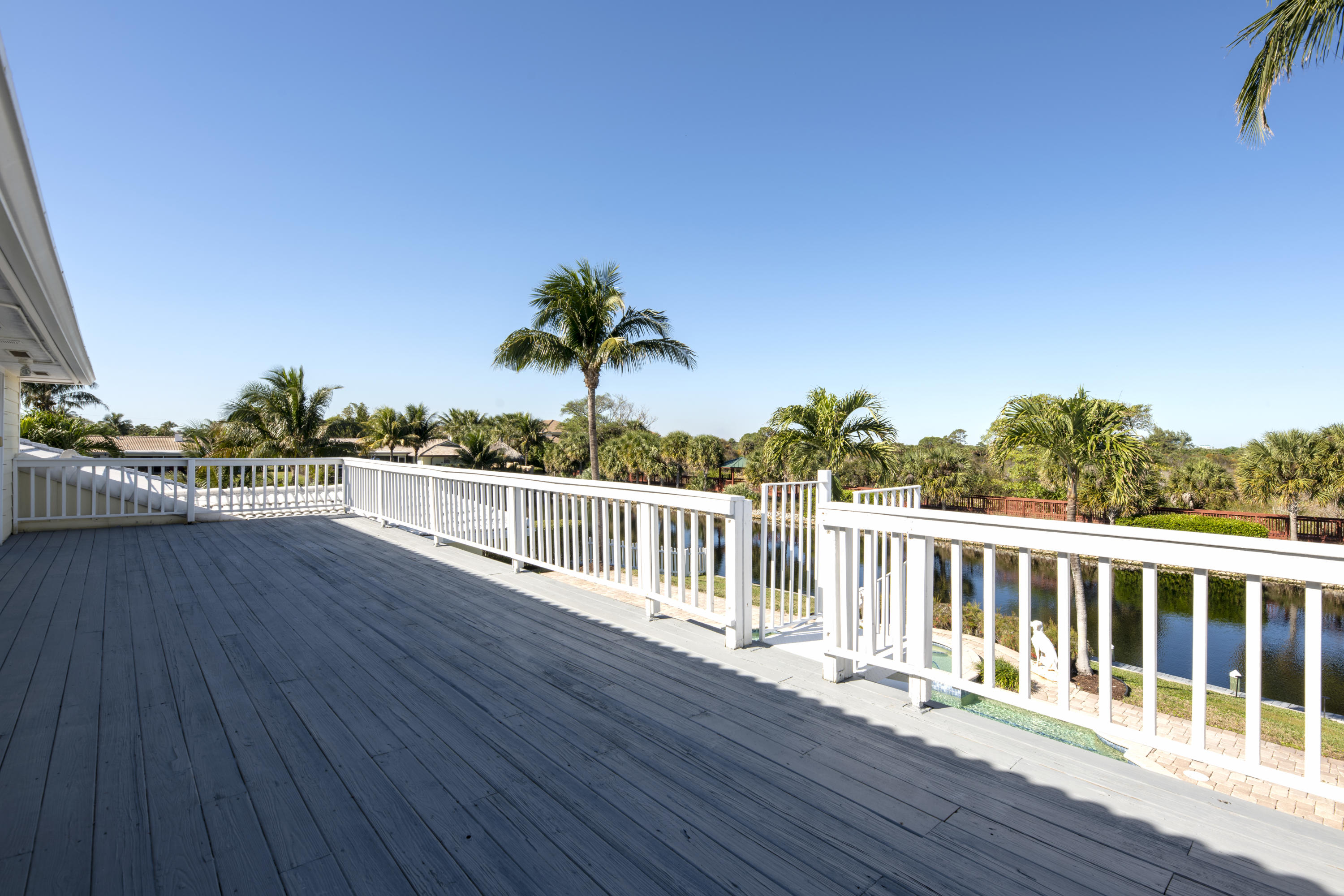 12920 Barrow Road North Palm Beach, FL 33408 - Photo 6 of 32 a view of a balcony with wooden floor