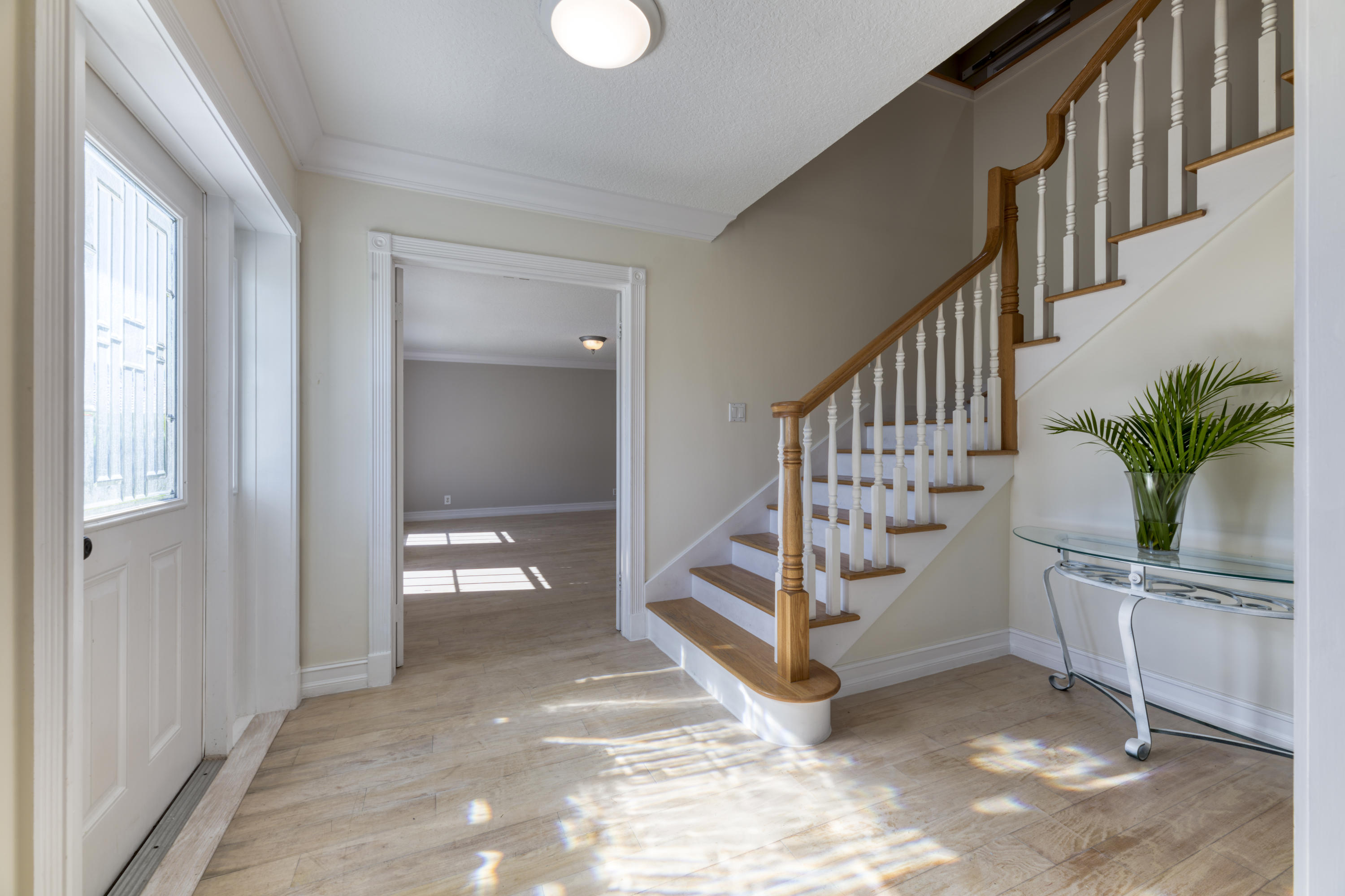 12920 Barrow Road North Palm Beach, FL 33408 - Photo 7 of 32 a view of entryway with wooden floor
