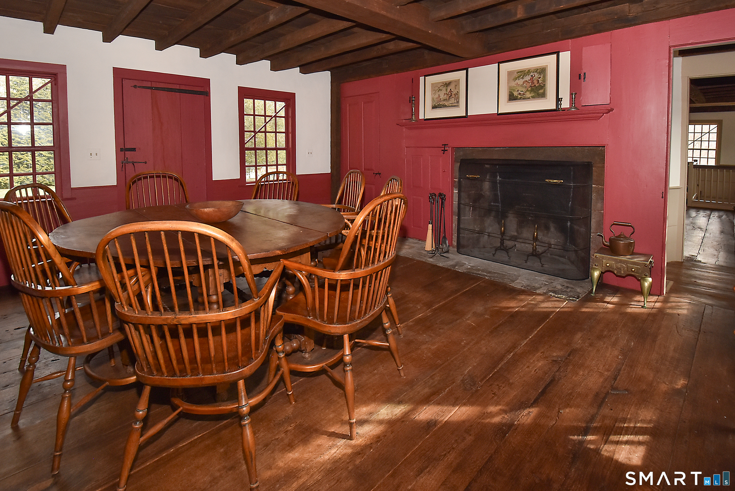 294 Jones Hollow Road Marlborough, CT 06447 - Photo 12 of 33 a view of a dining room with furniture window and wooden floor