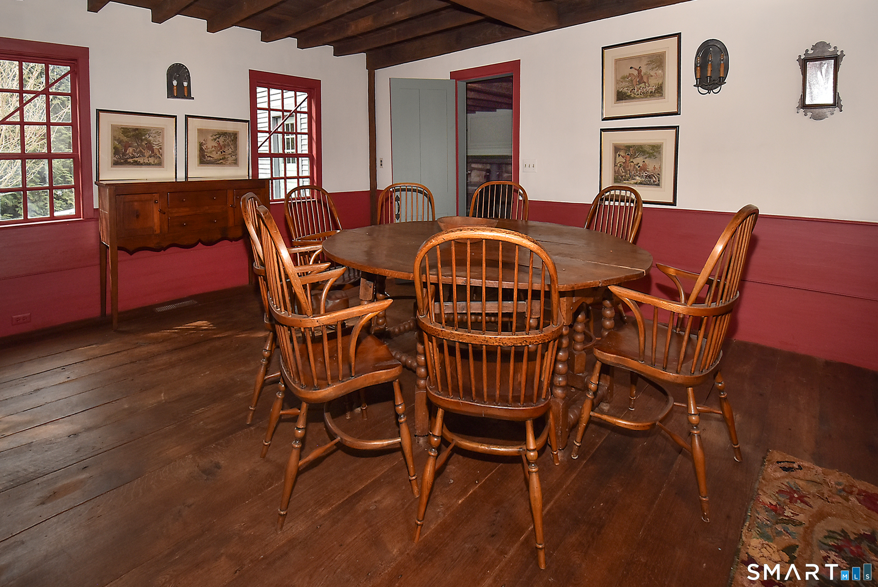 294 Jones Hollow Road Marlborough, CT 06447 - Photo 13 of 33 a view of a dining room with furniture window and wooden floor