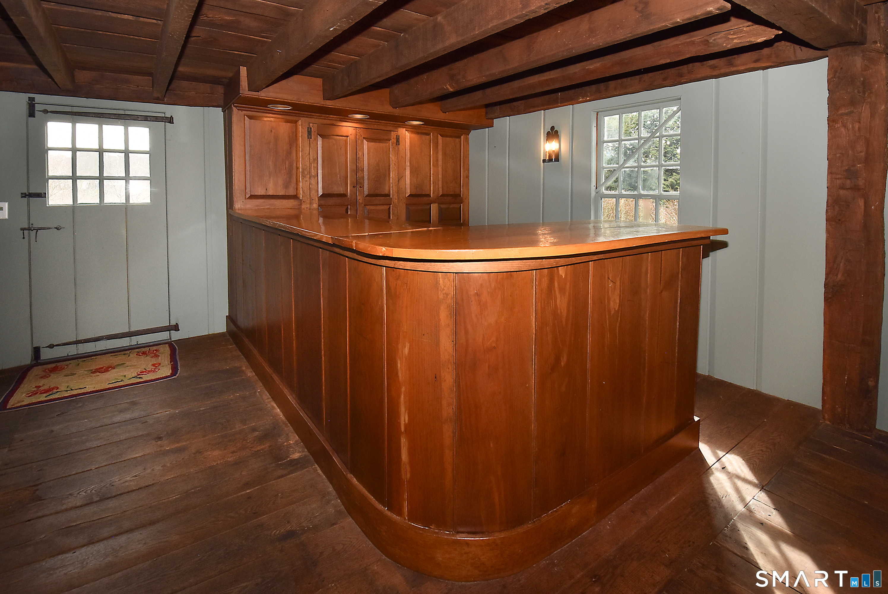 294 Jones Hollow Road Marlborough, CT 06447 - Photo 16 of 33 a view of a room with wooden floor and windows