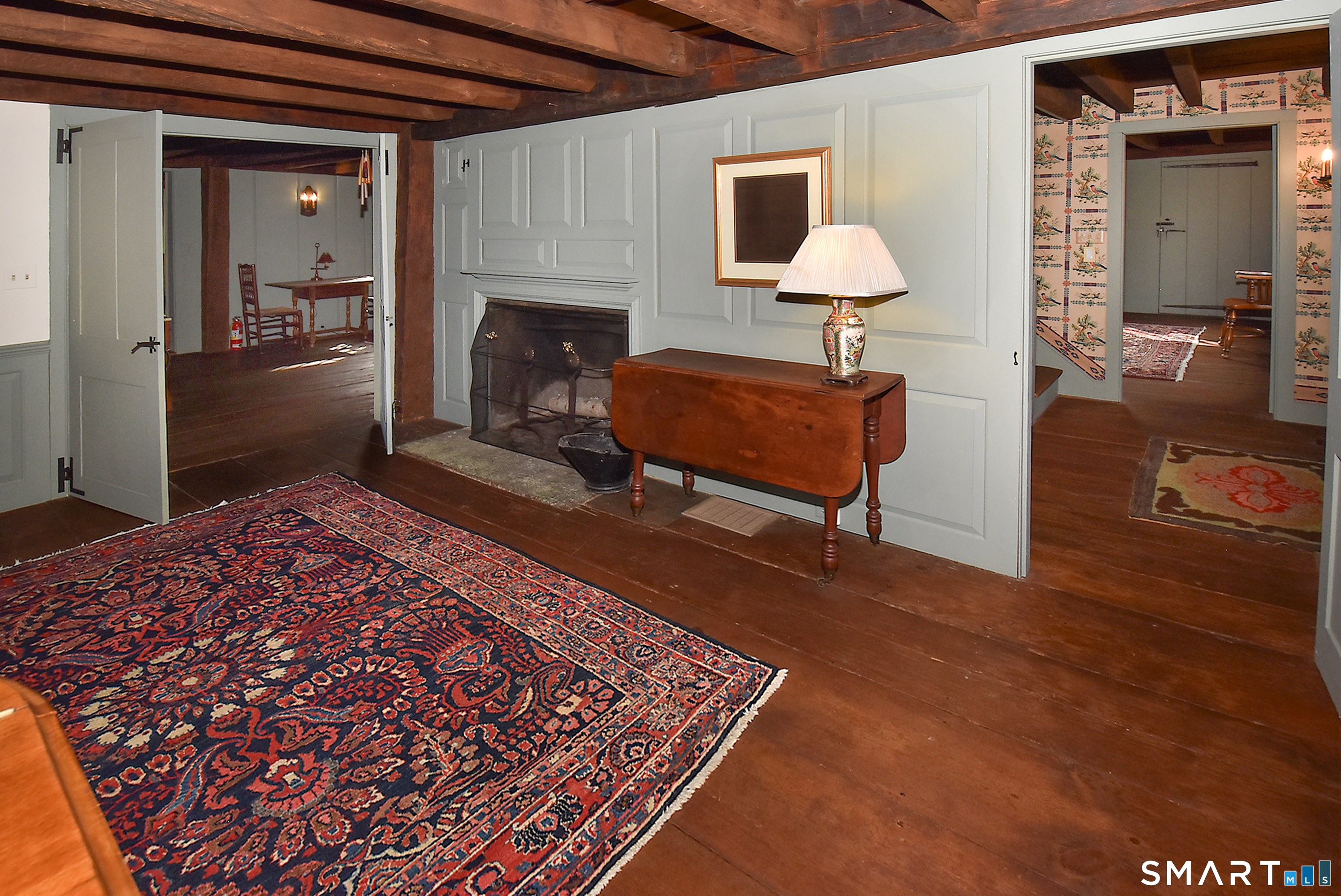 294 Jones Hollow Road Marlborough, CT 06447 - Photo 19 of 33 a living room with a couch and a fireplace