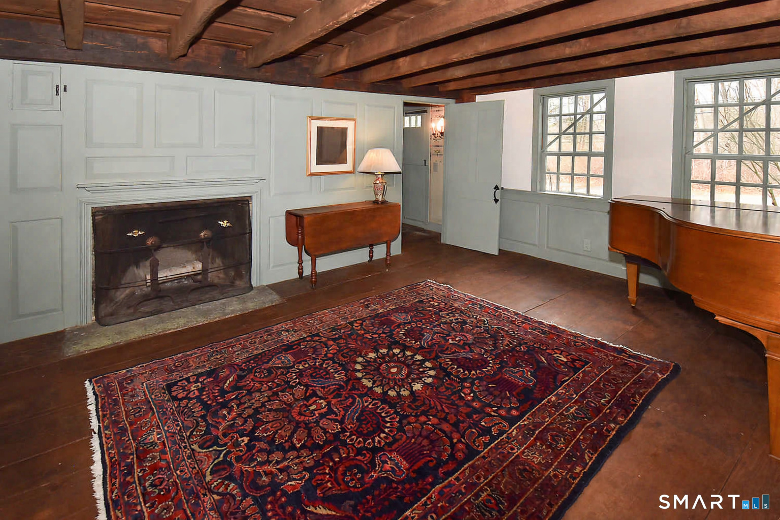294 Jones Hollow Road Marlborough, CT 06447 - Photo 20 of 33 a living room with a couch and a fireplace