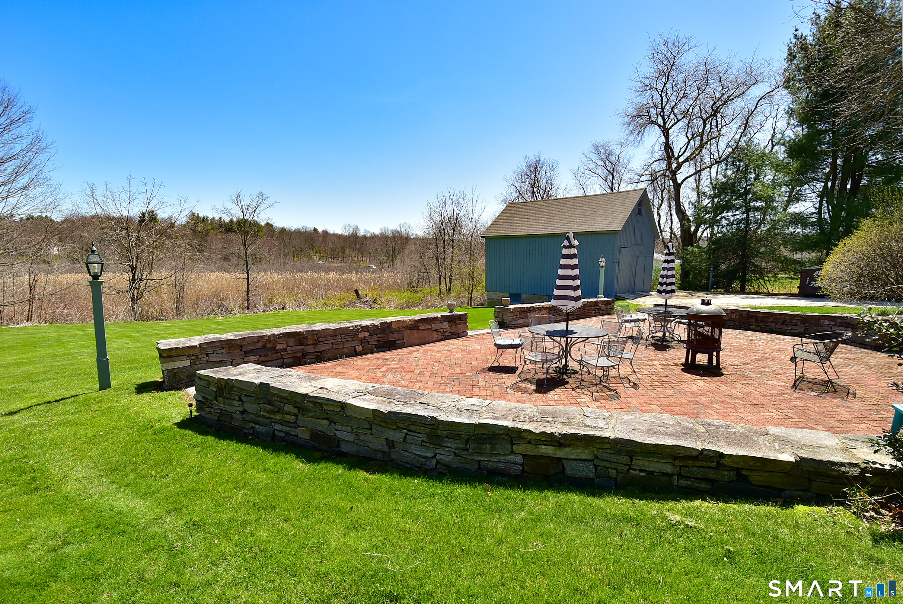 294 Jones Hollow Road Marlborough, CT 06447 - Photo 4 of 33 a view of a house with backyard and sitting area