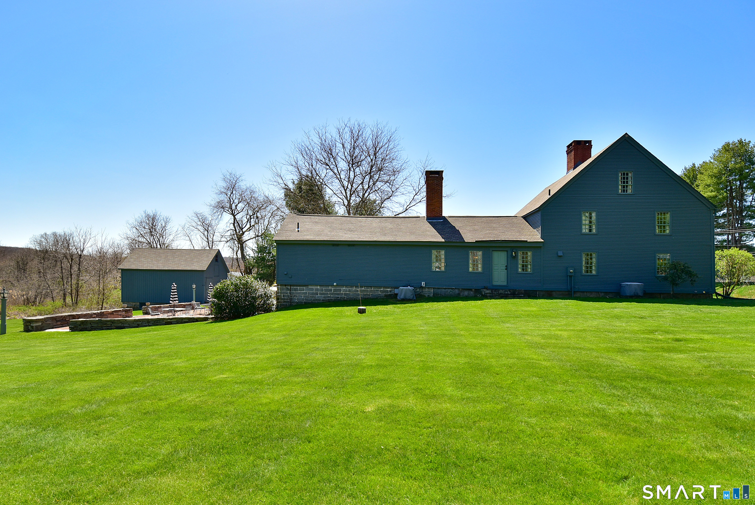 294 Jones Hollow Road Marlborough, CT 06447 - Photo 5 of 33 a front view of a house with a yard and garage
