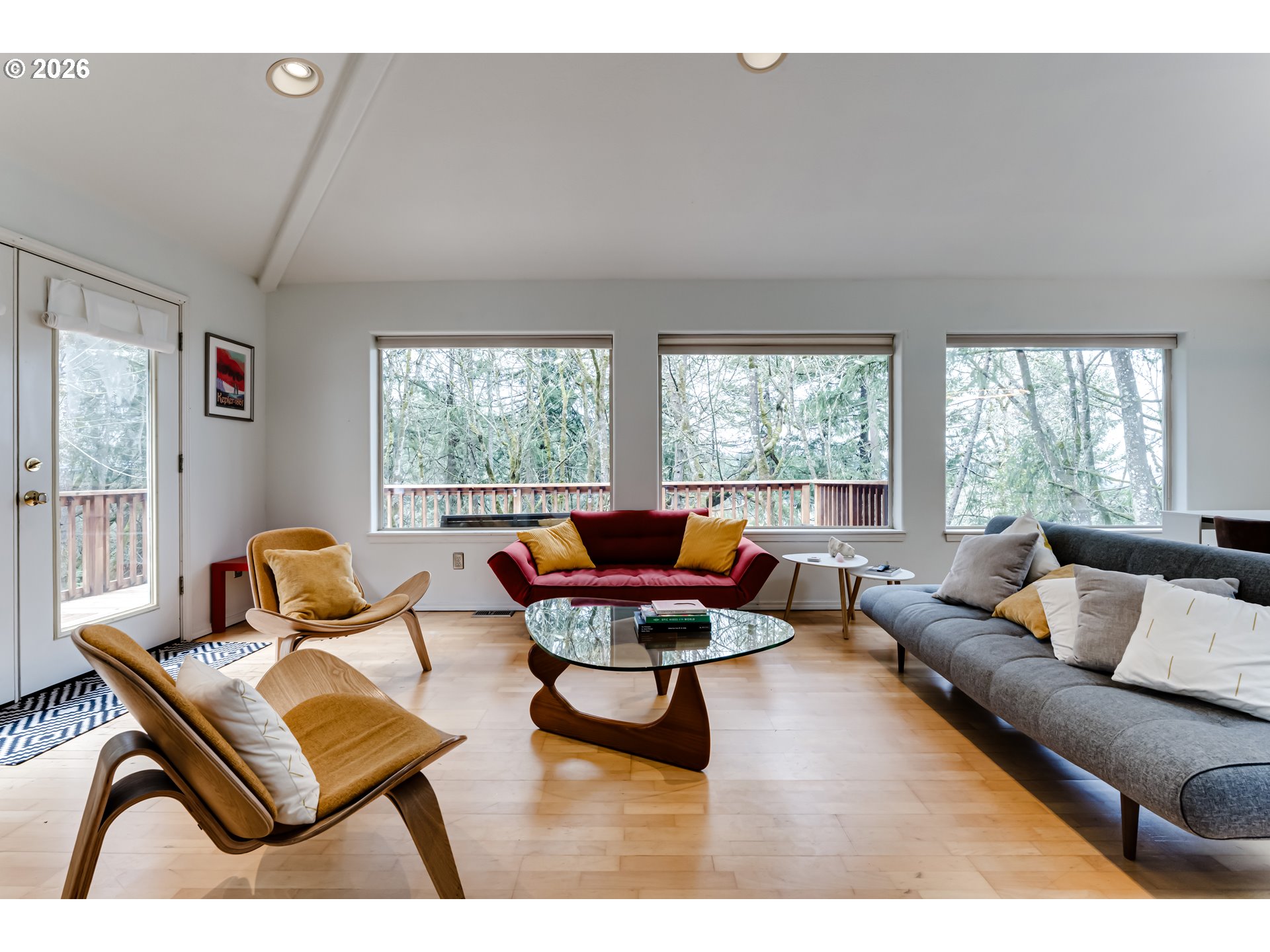2736 Kismet Way Eugene, OR 97405 - Photo 4 of 48 a living room with furniture and floor to ceiling windows