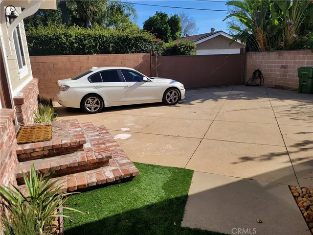a car parked in front of a house