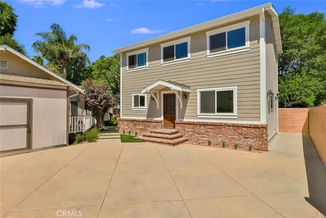 a view of a entryway with wooden floor