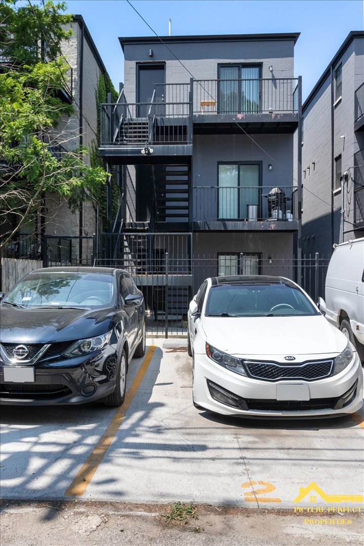 6337 South Ellis Avenue, Unit 3 Chicago, IL 60637 - Photo 12 of 12 a view of a car park in front of house