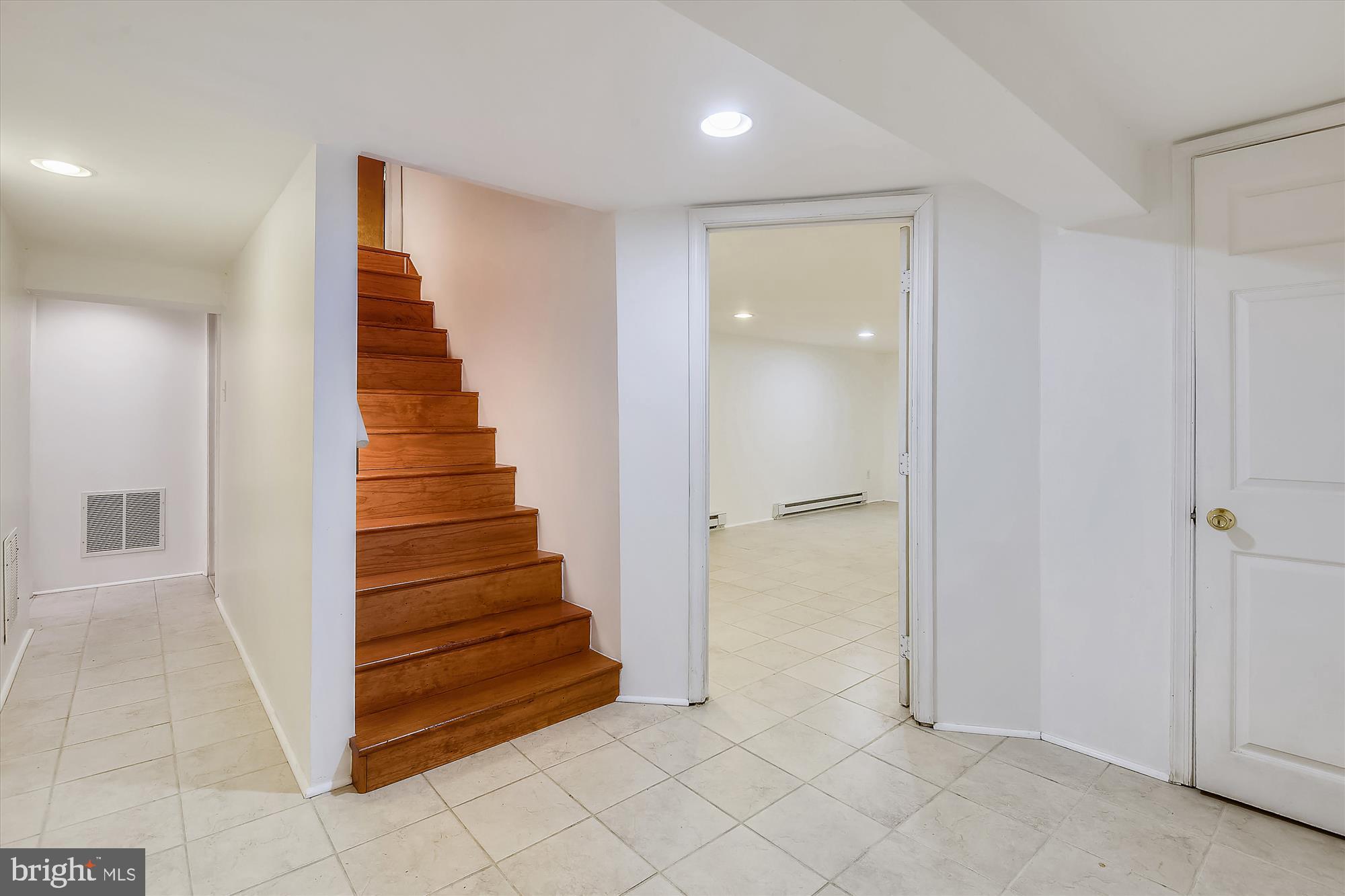 1137 Hampton Road Annapolis, MD 21409 - Photo 28 of 61 Lower Level Hallway with Ceramic Tile Flooring