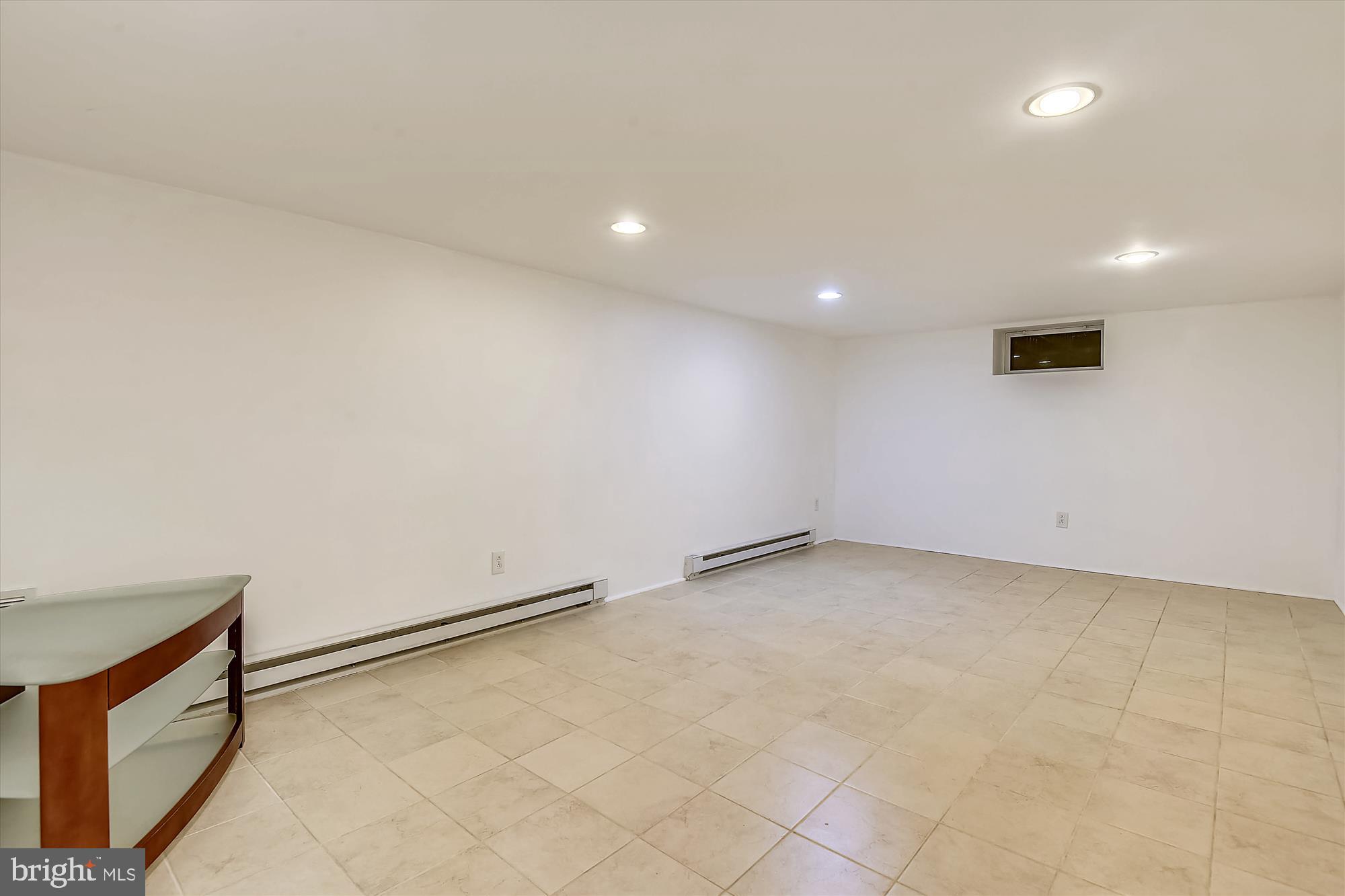1137 Hampton Road Annapolis, MD 21409 - Photo 32 of 61 Den with Overhead lighting and window under Deck.