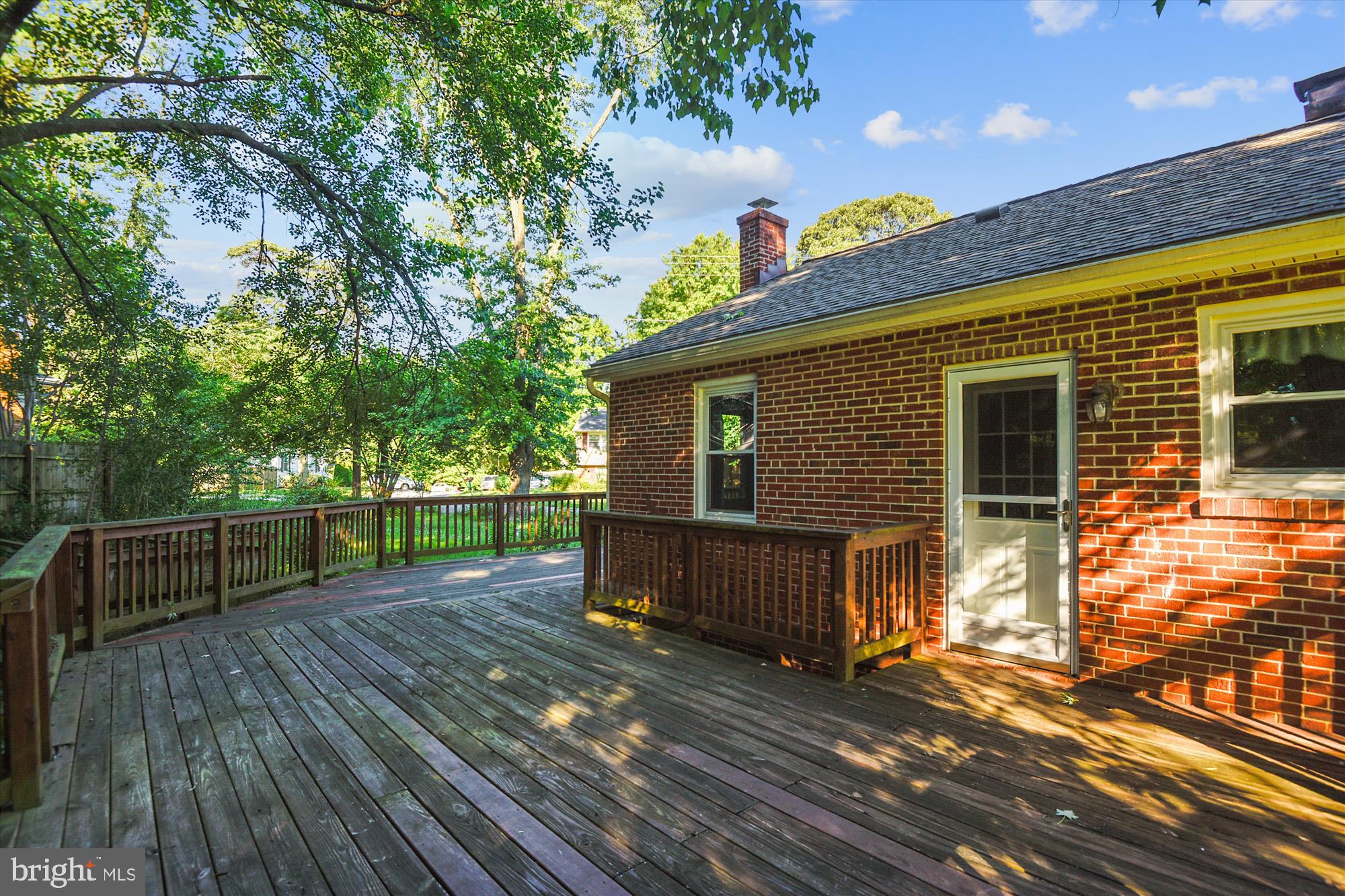 1137 Hampton Road Annapolis, MD 21409 - Photo 38 of 61 Wraparound Deck Accessed from Kitchen & Sunroom