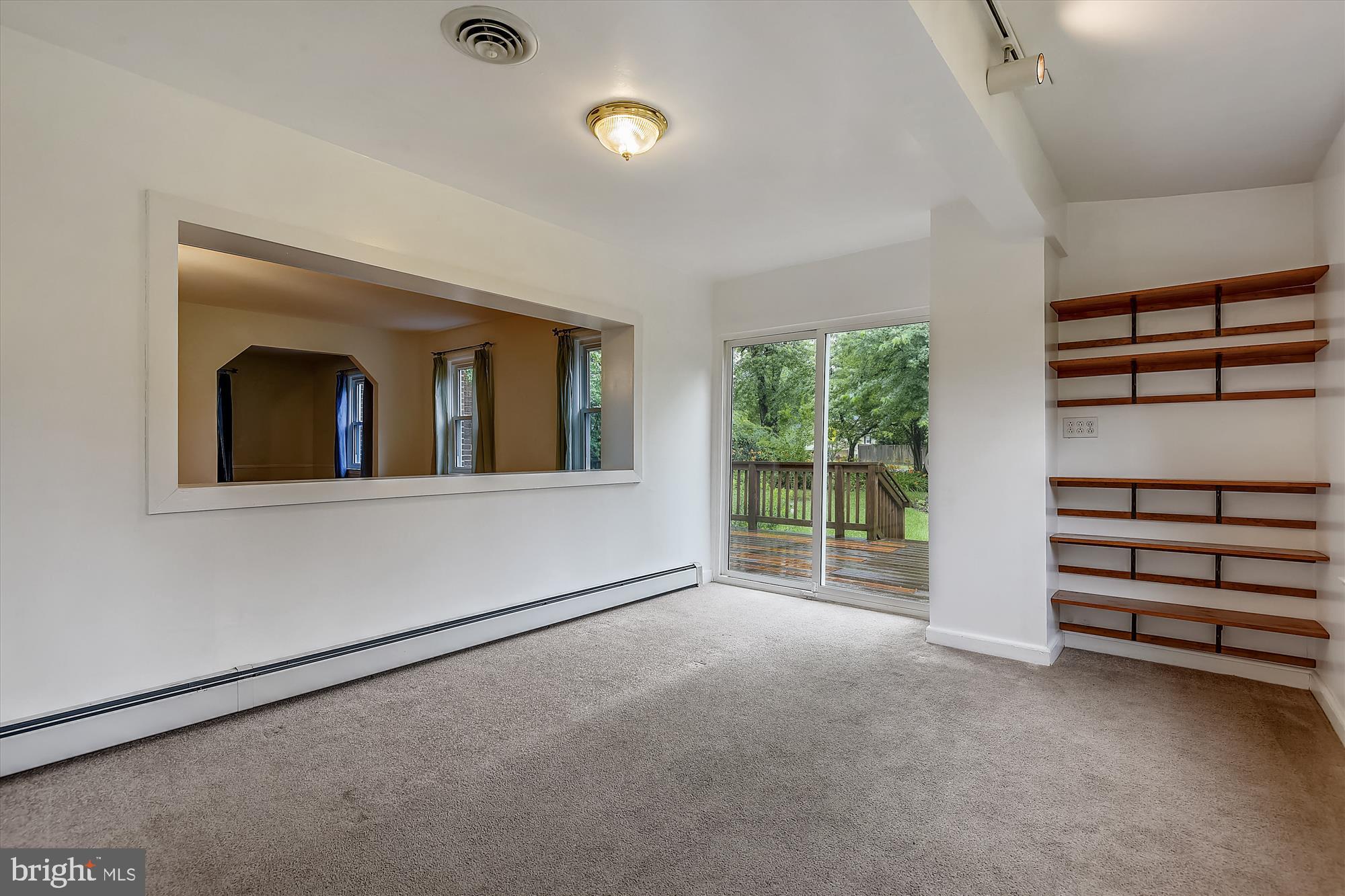 1137 Hampton Road Annapolis, MD 21409 - Photo 5 of 61 Sunroom w/large Opening to Living Room & Shelves