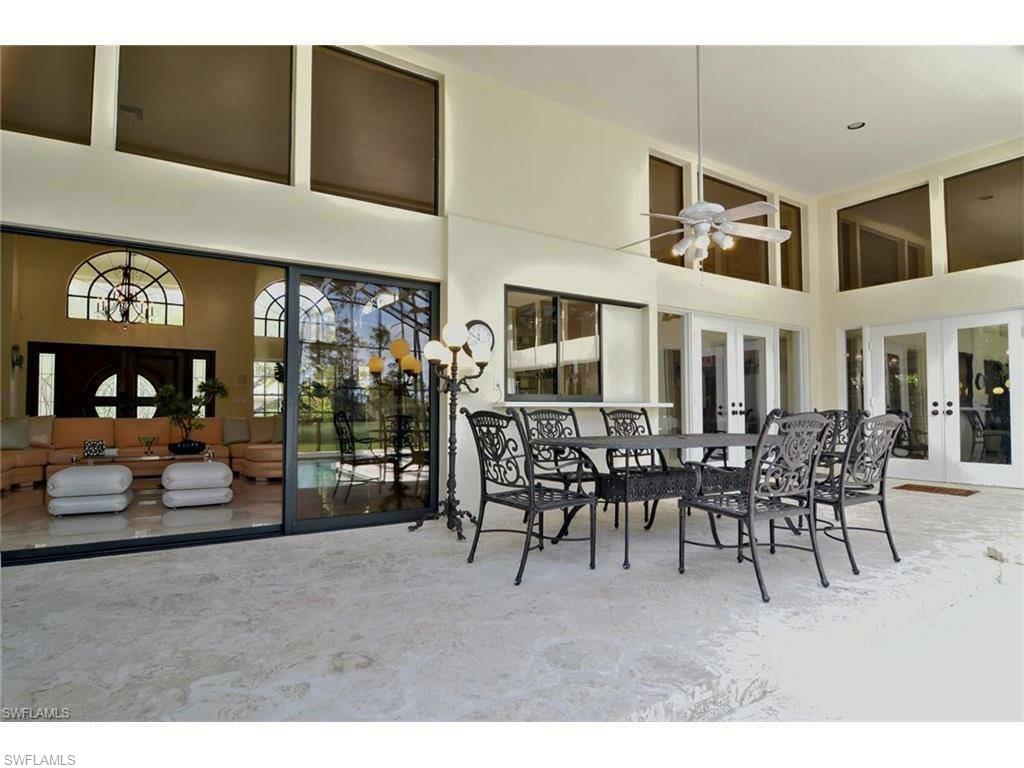 12902 Coco Plum Lane Naples, FL 34119 - Photo 14 of 23 a view of a livingroom with furniture