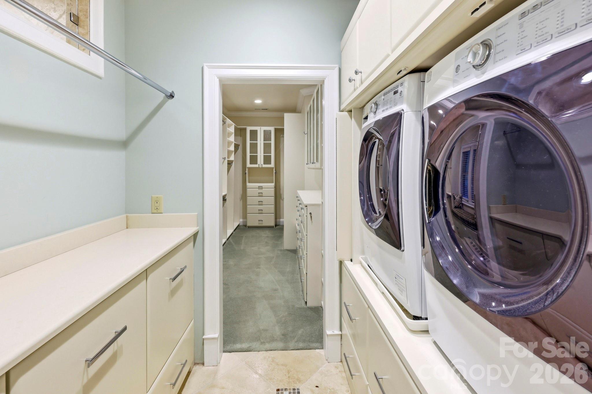 151 Garner Road Lake Lure, NC 28746 - Photo 20 of 48 a utility room with sink dryer and washer