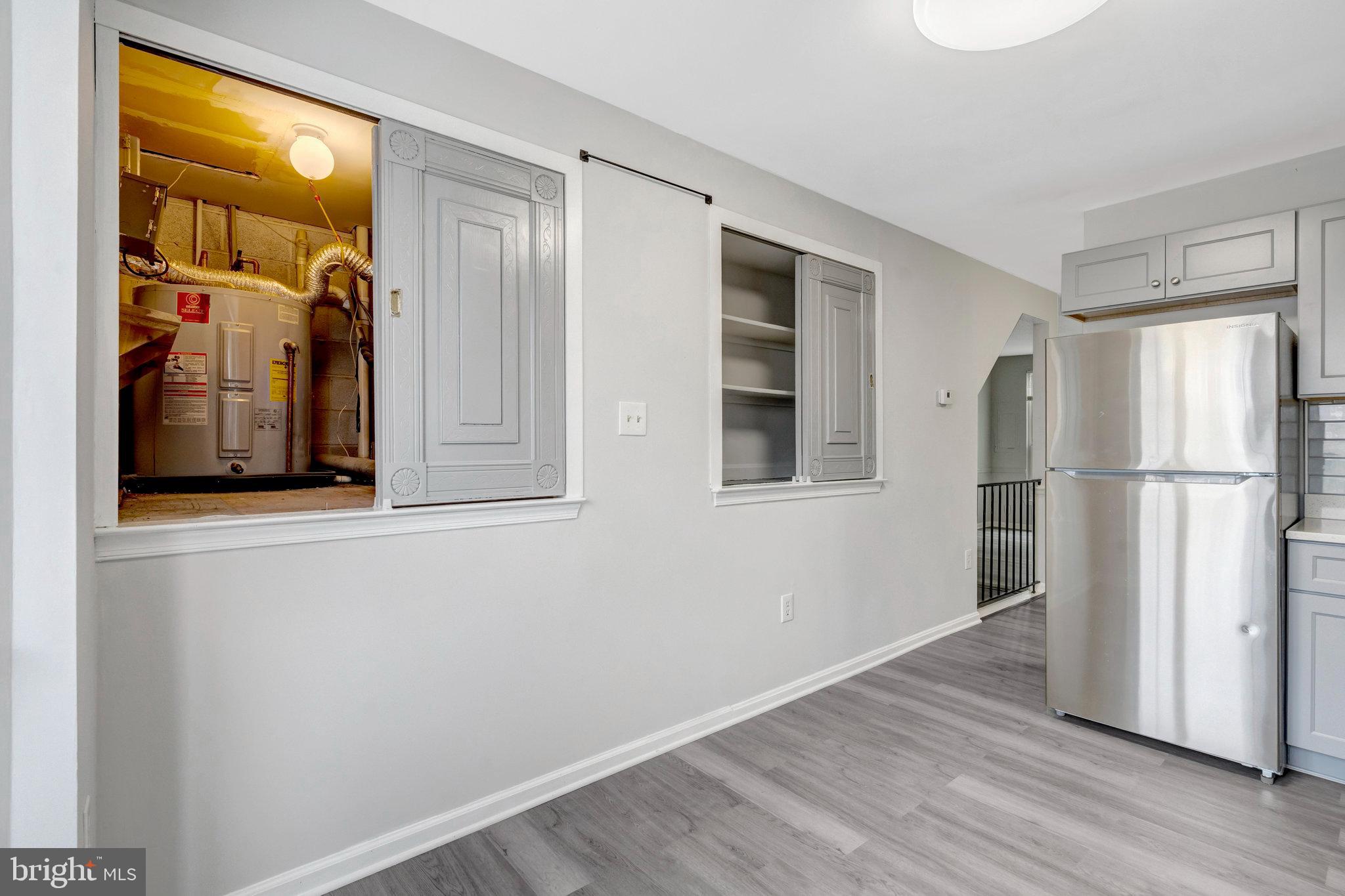 7905 Brighton Way Manassas, VA 20109 - Photo 14 of 32 a view of entryway with wooden floor
