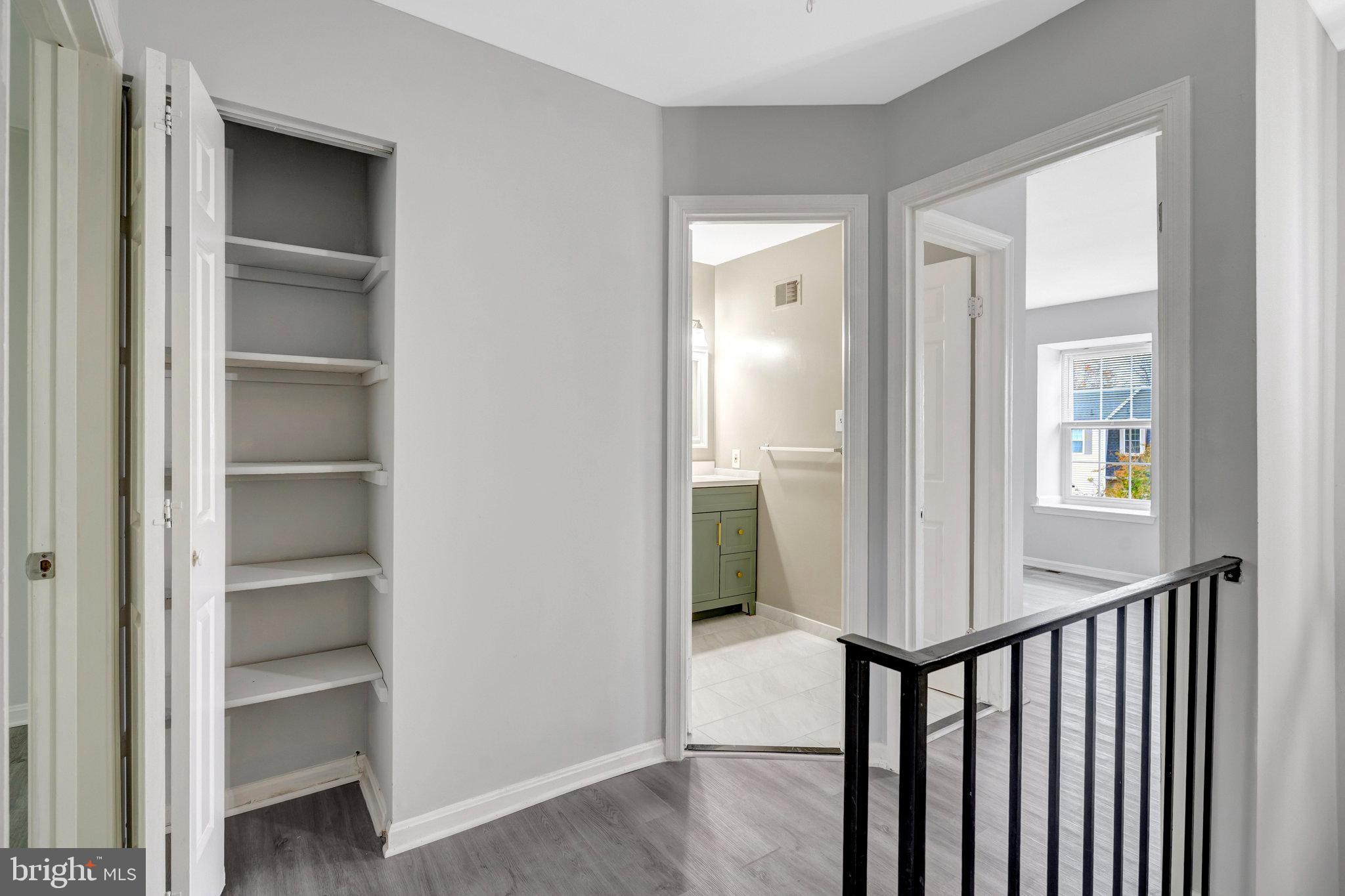 7905 Brighton Way Manassas, VA 20109 - Photo 18 of 32 a view of a hallway with wooden floor and entryway