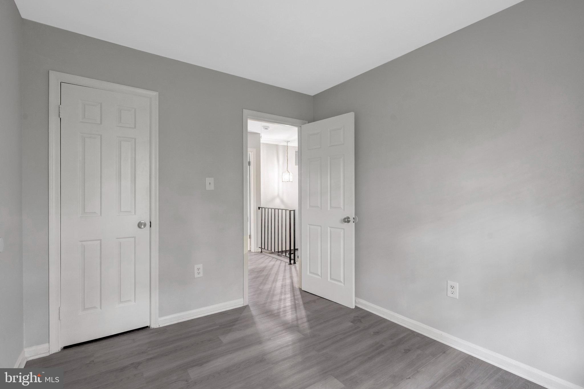 7905 Brighton Way Manassas, VA 20109 - Photo 22 of 32 a view of wooden floor and windows in a room