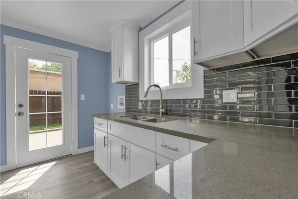 a bathroom with a bathtub and shower