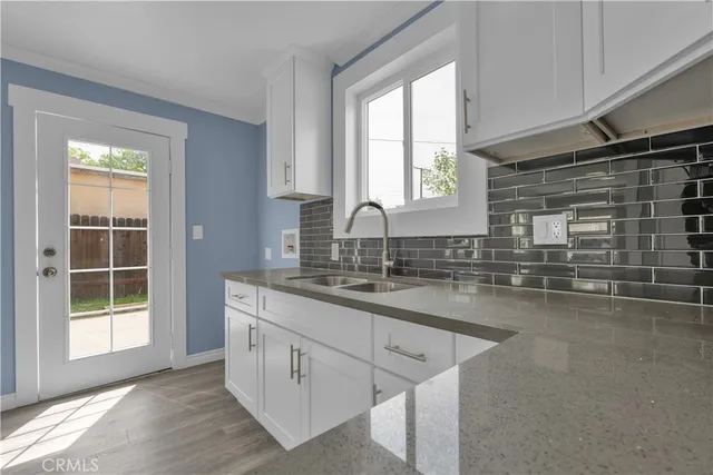 a bathroom with a bathtub and shower