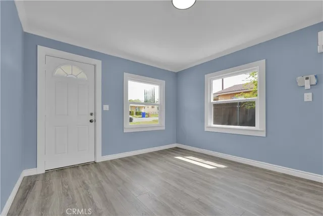 a bathroom with a bathtub sink and cabinets