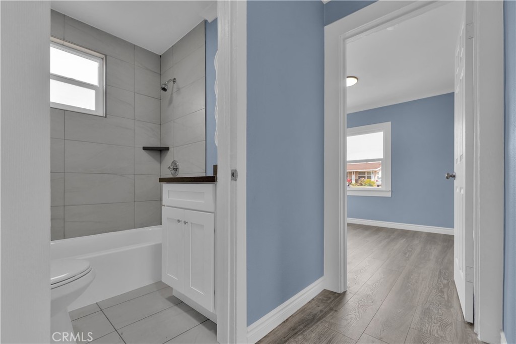 34945 Ave B Yucaipa, CA 92399 - Photo 23 of 69 a bathroom with a bathtub and shower