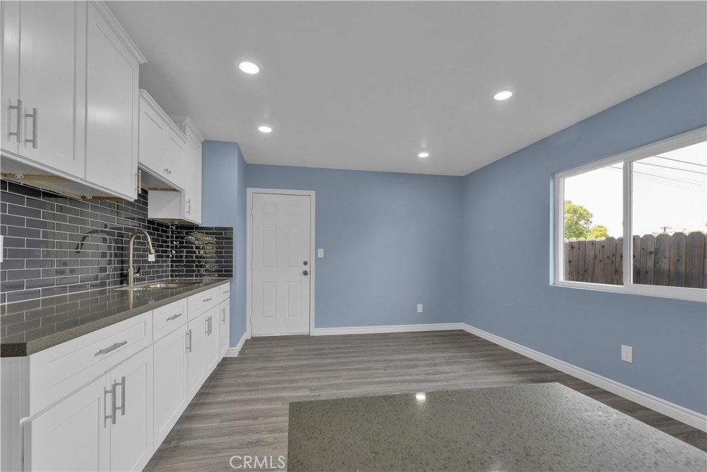 34945 Ave B Yucaipa, CA 92399 - Photo 36 of 69 a kitchen with a sink and cabinets