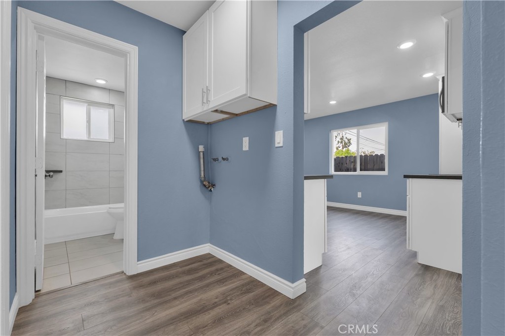 34945 Ave B Yucaipa, CA 92399 - Photo 41 of 69 an empty room with wooden floor and windows