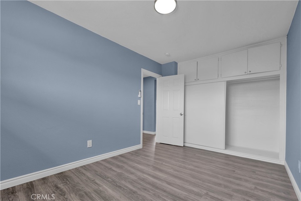 34945 Ave B Yucaipa, CA 92399 - Photo 47 of 69 a view of an empty room with wooden floor