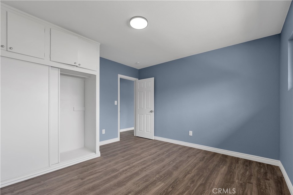 34945 Ave B Yucaipa, CA 92399 - Photo 49 of 69 a view of an empty room with wooden floor